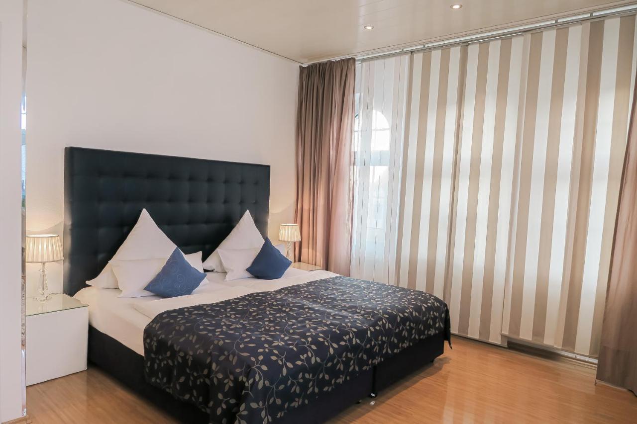 Hotel Service Apartments Am Prinzenplatz Kamp-Lintfort Bagian luar foto